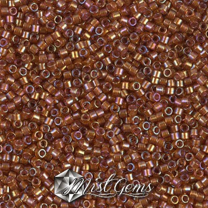 Delica 11/0 DB 1736 Sparkling Beige Lined Dark Topaz AB