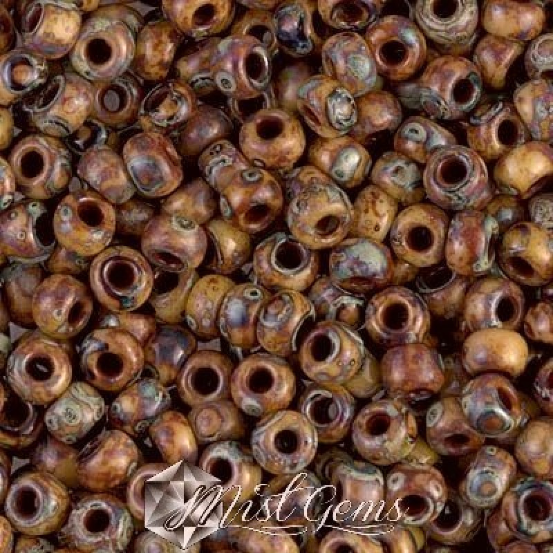 Miyuki Round Rocailles RR06/0-4505 Picasso Transp Light Smoky Topaz
